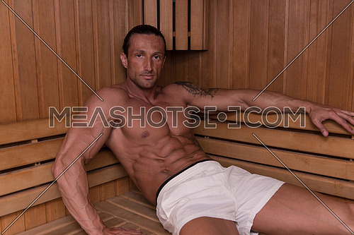 Attractive Mature Man Resting Relaxed In Sauna-95060 | Meashots