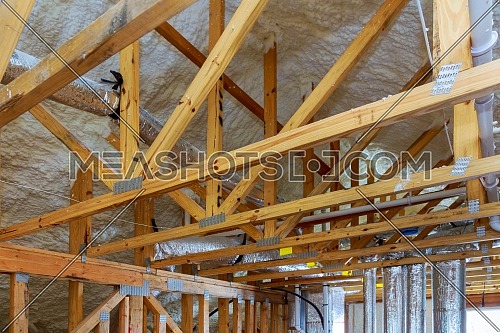 Attic With Foam Insulation Of Heating System On The Roof Of The