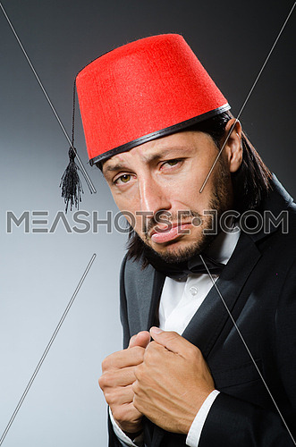 Man in traditional turkish hat and dress-16601