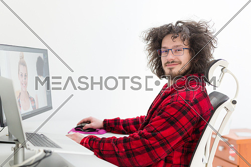 graphic designer in bathrobe working at home-182312 | Meashots
