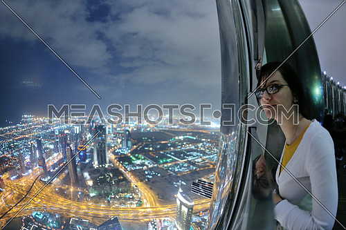 beautiful woman portrait with big city at night in background-23114 |  Meashots