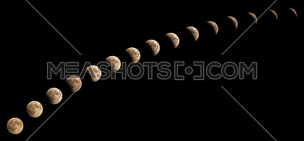 Time series of lunar eclipse on July 27 2018, sequence of phases from 8:08 pm to 9:18pm, captured in Cairo, Egypt. Assembled of 15 photos with almost five minutes time interval between each other