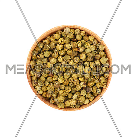Close up one wooden bowl full of green pepper peppercorns isolated on white background, elevated top view, directly above