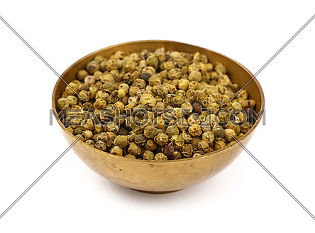 Close up one bronze metal bowl full of green pepper peppercorns isolated on white background, high angle view