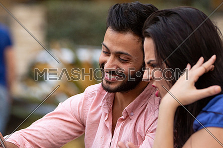 male and female couple spending time together outdoors