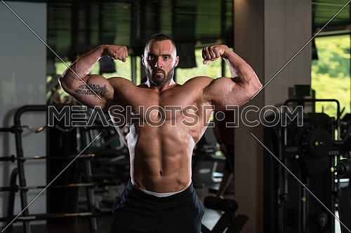 Premium Photo  Male athlete with muscular build does workout