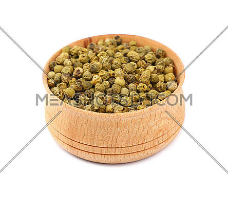 Close up one wooden bowl full of green pepper peppercorns isolated on white background, high angle view
