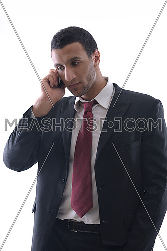 Portrait of a business man talk with cell mobile  phone isolated on white background. Studio shot communication concept