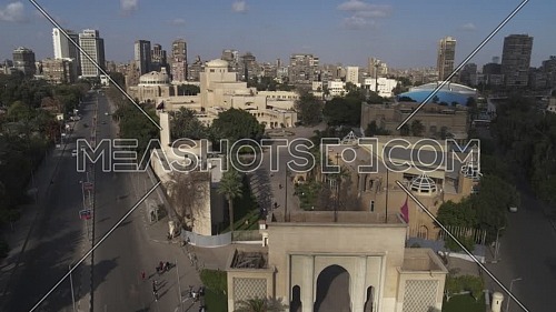 Aerial shot flying over Cairo Downtown empty streets showing Cairo Opera House during the corona pandemic lockdown by day 10 April 2020