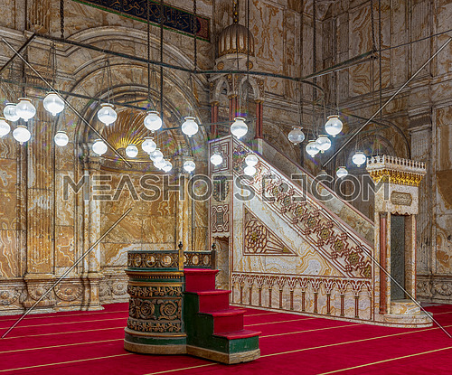 Decorated alabaster (marble) wall with engraved niche (Mihrab) and Platform (Minbar) at the great Mosque of Muhammad Ali Pasha (Alabaster Mosque), situated in the Citadel of Cairo in Egypt