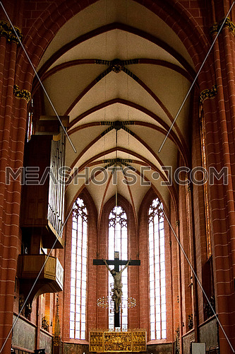Jesus on the cross inside a church In Barcelona
