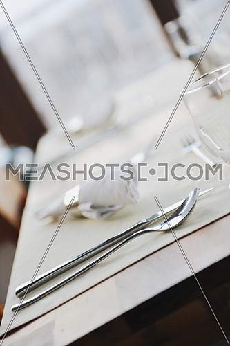 luxury restaurant indoor with nice cutlery and decoration