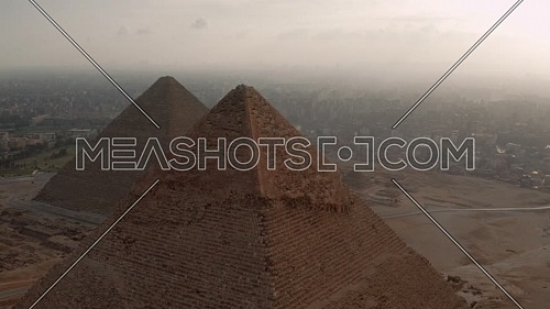 flying through pyramids of khafraa revealing pyramids of khofo at sunrise