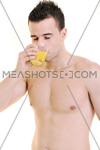 young fit man dringing orange juice isolated on white