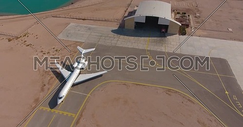 Aerial shot flying above Planes Hanger in Al Gouna at Day 