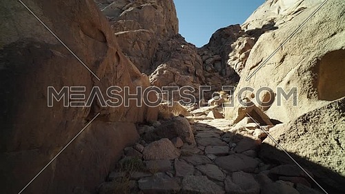 Reveal shot for passage in Sinai Mountain at day.