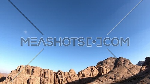Tilt up shot for exploring Sinai/moses  Mountain at sunset.
