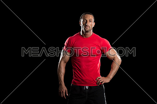 Muscular Mature Man Posing In Studio - Isolated On Black Background
