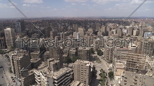 Aerial shot flying over Cairo Downtown empty streets during the corona pandemic lockdown by day 10 April 2020