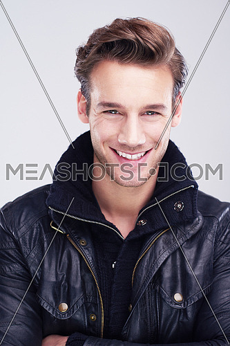 handsome young man portrait isolated on white background in studio