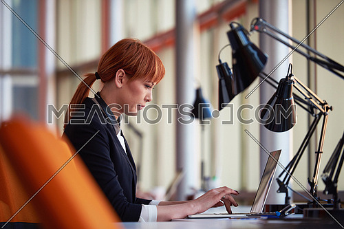 business woman working on computer at modern office