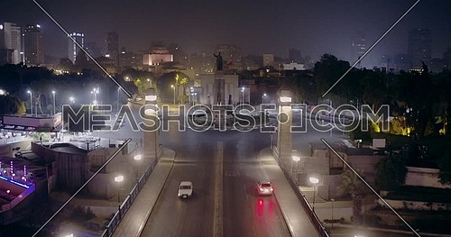 Drone shot fly in Kasr Al Nile Bridge until Saad Zagloul Statue at Opera Square in Cairo at night