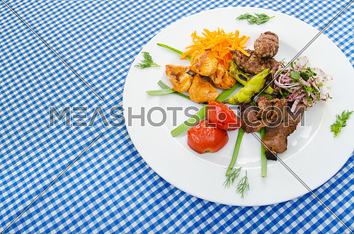 Plate with tasty lamp kebabs