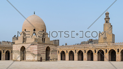 Courtyard of Ibn Tulun public historical mosque with ablution fountain and the minaret, Sayyida Zaynab district, Medieval Cairo, Egypt