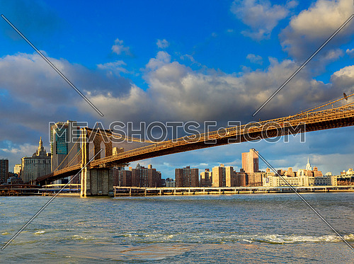 The Brooklyn Bridge and Manhattan Skyline from Brooklyn, New York.