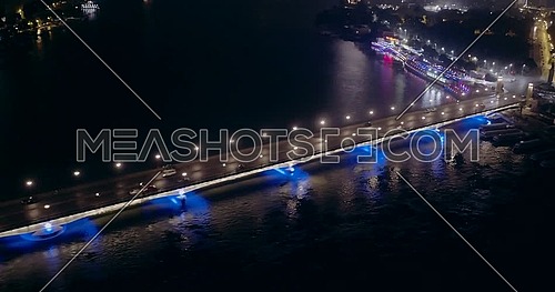 Drone side shot showing Kasr Al Nile Bridge in Cairo at night