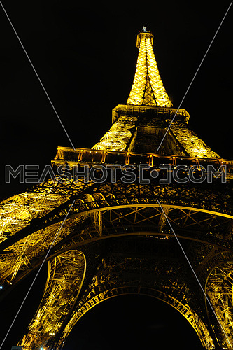 eiffel tower in paris at night tourist and travel icon and attraction