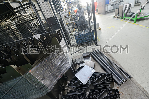 Final stage CNC material. Metal products after processing on CNC machines stand on pallets ready for transport. High quality photo