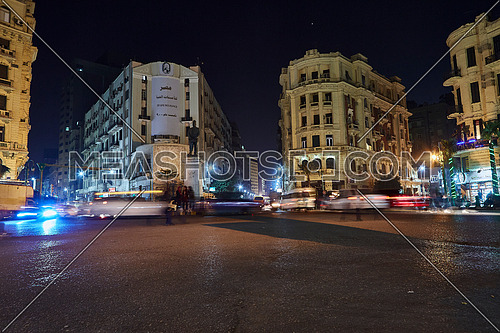 Fixed Shot for traffic at Talat Harb Square at Cairo at Night