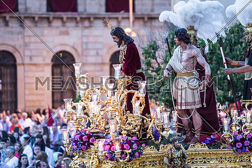 Brotherhood of Jesus corsage making station of penitence in front at the town hall, Linares, Jaen province, Andalusia, Spain