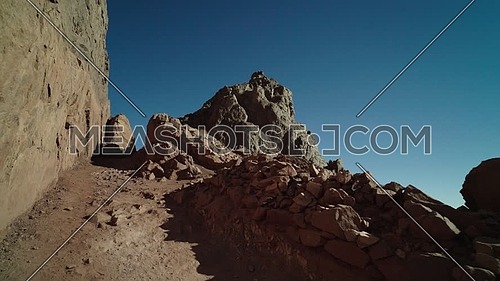 Track in for the climbing road to peak of Sinai Mountain
