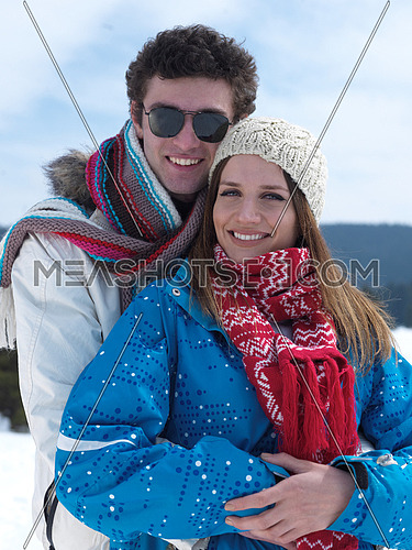 portrait of happy young romantic tourist  couple outdoor in nature at winter vacation