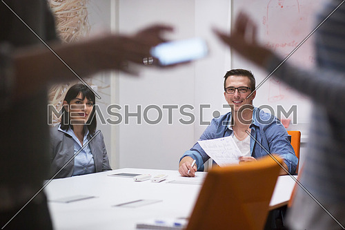 Group of business people discussing business plan  in the office