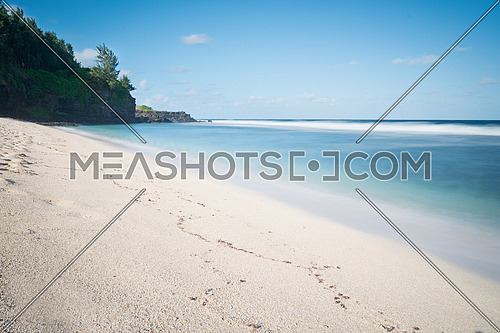 Amazing white sandy beach and blue indian ocean,Gris Gris tropical beach, cape on South of Mauritius,used nd filter for long exposure.