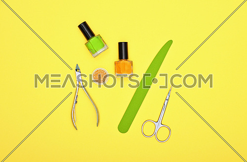Close up feminine hygiene, beauty, nail care and manicure set on yellow background, elevated top view, directly above