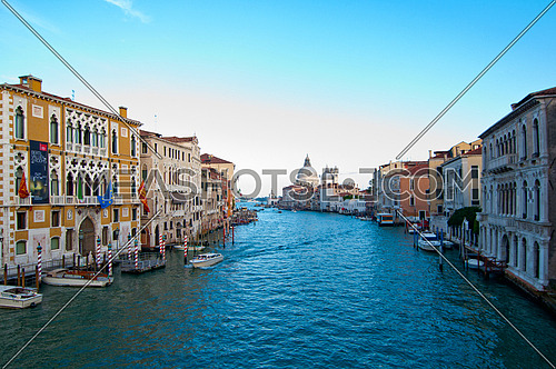 Venice Italy grand canal view from the top of Accademia bridge with "Madonna della Salute" church on background