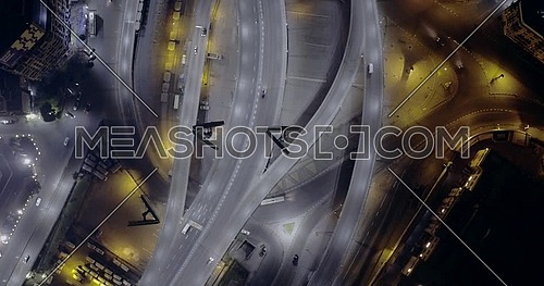 Aerial top shot for 6 of October Bridge over Abd Elmonan Reyad Bus Station At Tahrir Area in cairo at night