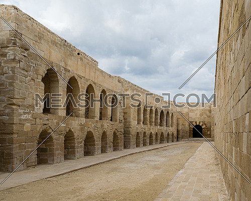 An open courtyard at an old citadel in Alexandria, Egypt. A 15th-century defensive fortress located on the Mediterranean sea coast, established in 1477 AD (882 AH)