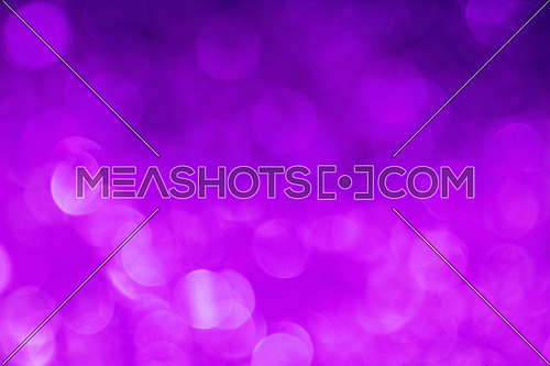 Vivid abstract background of purple, pink and violet defocused bokeh, blurred lights and sparkles