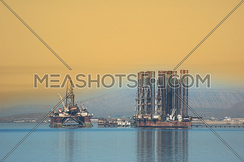 Two offshore rigs at  Caspian shore near Baku