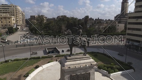 Reveal shot for Ibrahim Pasha Statue at Opera Square in Cairo Downtown empty streets during the corona pandemic lockdown by day 10 April 2020
