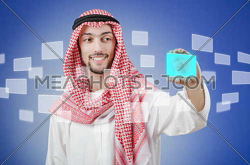 Young arab pressing virtual buttons