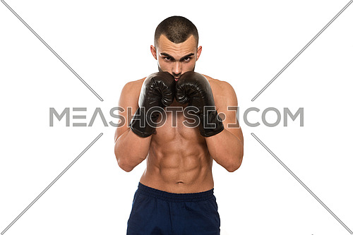 Young Muscular Sports Guy In Gloves With A Naked Torso Boxing - Isolated On White Background