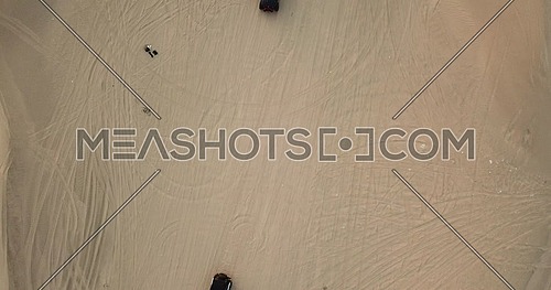 Drone Top shot for trucks off roading in the desert at day