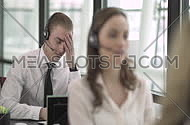 Call center employees helping clients customer support concept