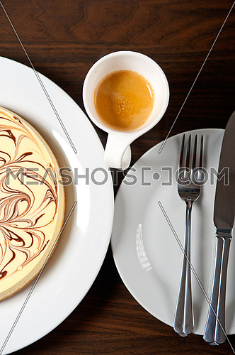 fresh baked classic Cheese cake with chocolate topping and espresso coffee